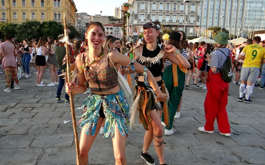 Wildwomen dancing in the craziness of carnival time. Rijeka carnival, Croatia