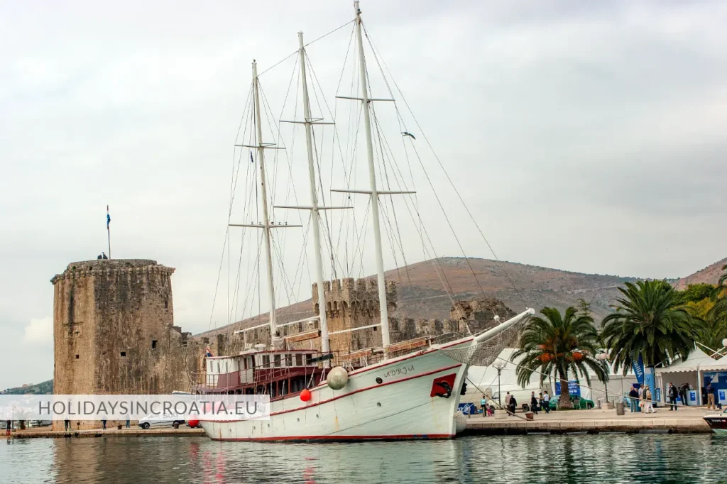 Sailing ship anchored near Kamerlengo fortress in Trogir Croatia