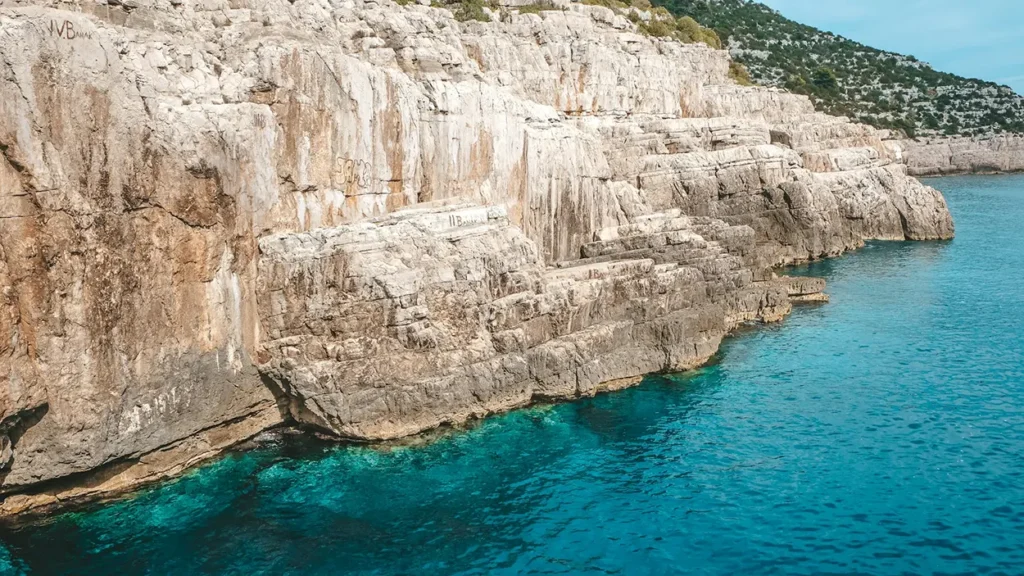 Rocky cliffs and crystal-clear turquoise sea on Mljet island, Croatia